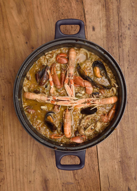 ¿Cómo hacer arroz con cigalas caldoso?